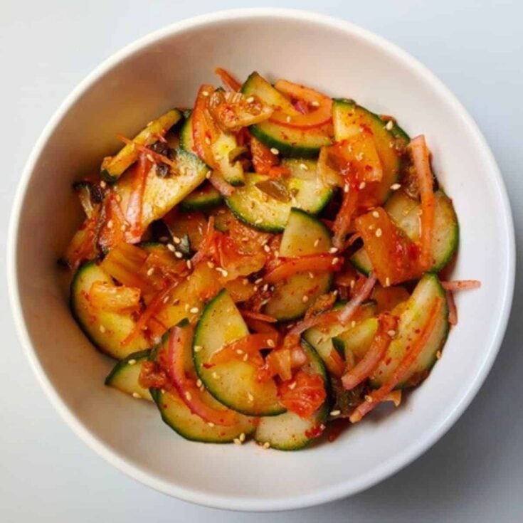 A bowl of kimchi cucumber summer salad recipe