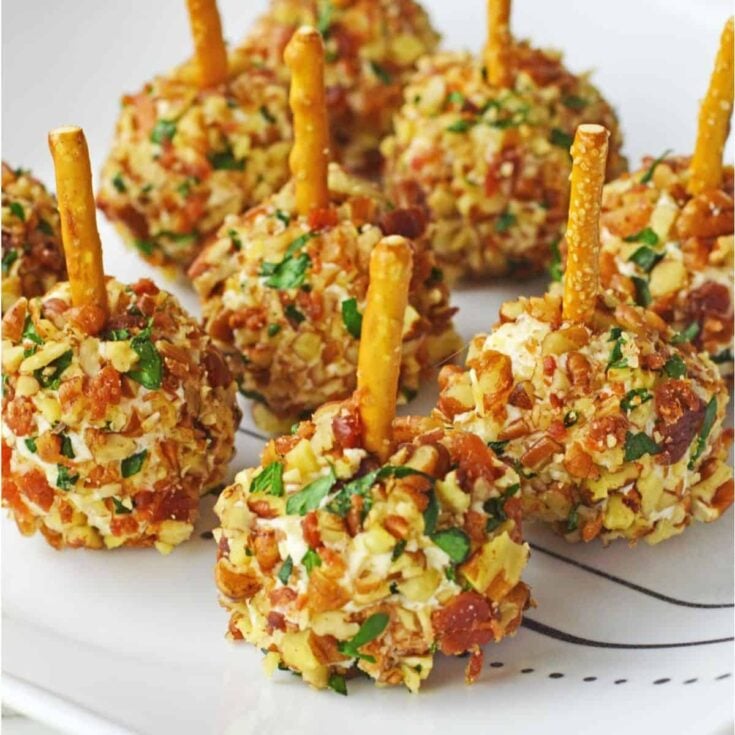 A plate of mini cheese balls cooked after reading these Tailgating recipes