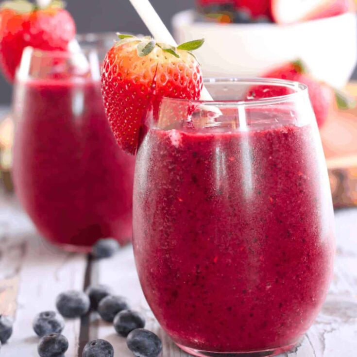Two glasses of non alcohol berry Bellini summer mocktails