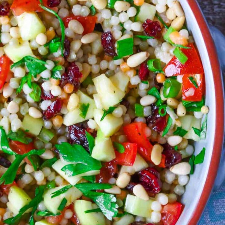 A bowl of pearl couscous salad cooked after reading these Picnic food ideas