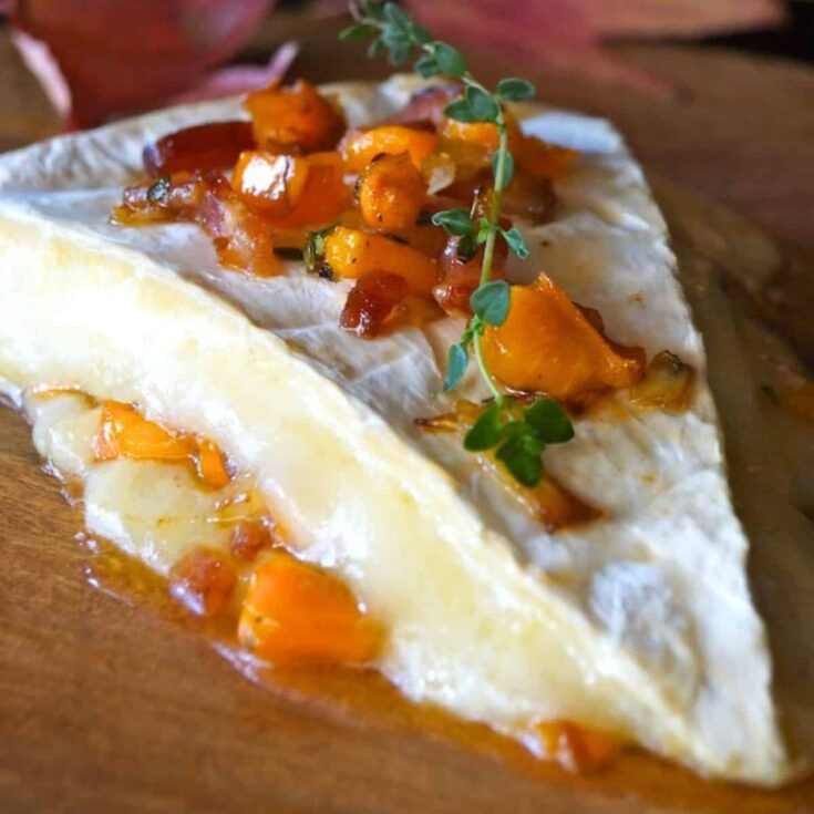 Persimmon bacon baked brie prepared after reading these Fall appetizers recipe