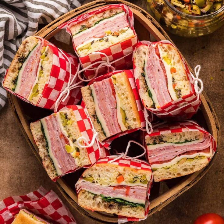 A set of delicious pressed Italian picnic sandwiches, prepared after reading these summer appetizer recipes