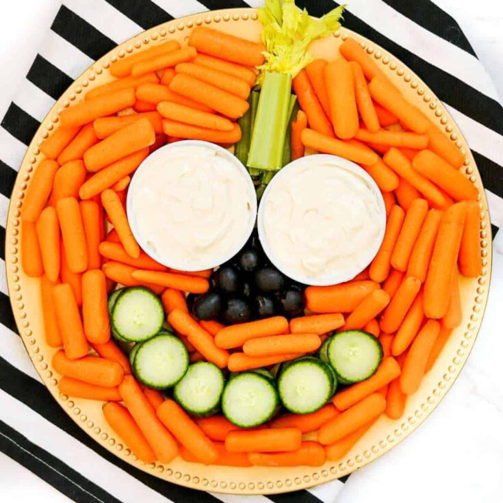 Pumpkin Halloween veggie tray for parties prepared after reading these Halloween starters