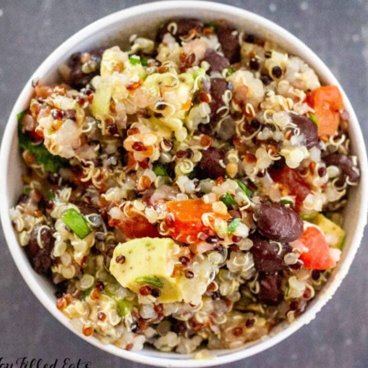 A bowl of Quinoa black bean avocado summer salad recipe