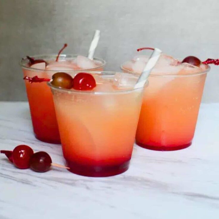 Three glasses of Simba's sunrise punch summer mocktails