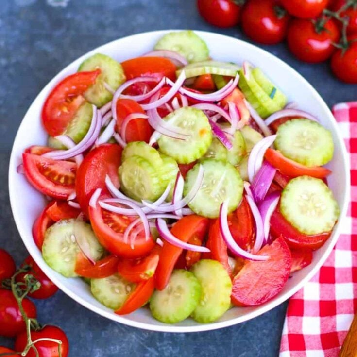 A bowl of tomato cucumber onion, cooked after reading these summer salad recipes