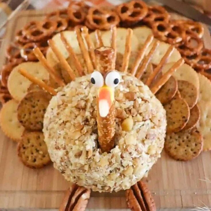 Turkey cheese ball filled with biscuits, prepared after reading these Thanksgiving appetizers