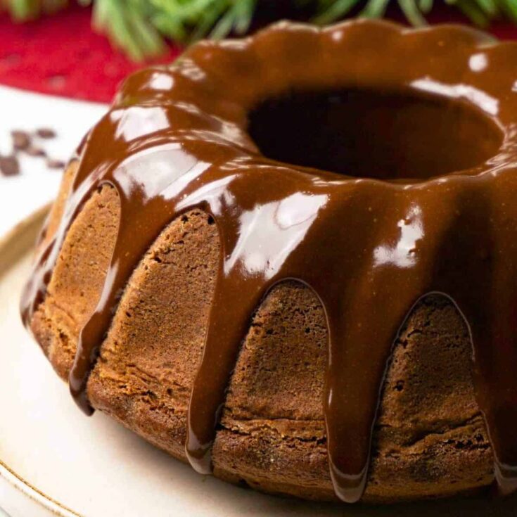 Chocolate Christmas cake topped with chocolate cream, baked after reading these Christmas Bundt cake recipe
