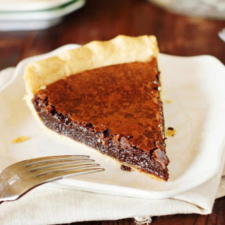 A slice of chocolate crack pie baked after reading these Chocolate Thanksgiving Desserts