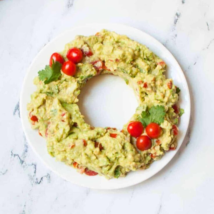 A plate of Christmas guacamole cooked after reading these Christmas appetizers