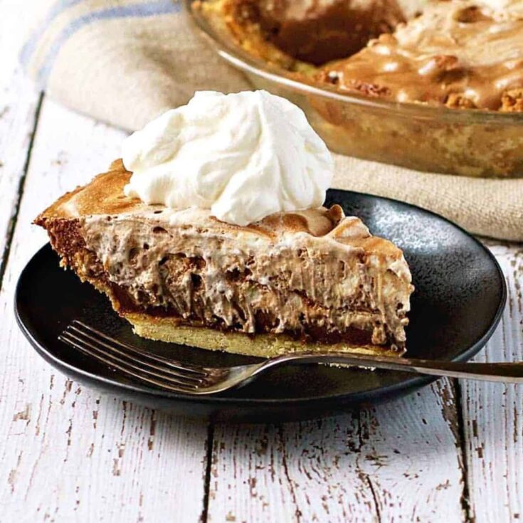 A slice of grandma's chocolate rum pie baked after reading these Chocolate Thanksgiving Desserts