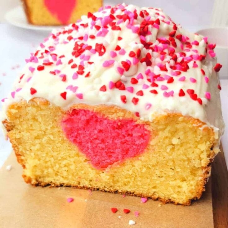 A slice of a hidden heart cake baked after reading these Valentines day cake recipes