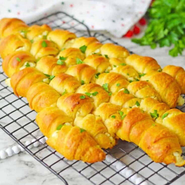 Pull-apart crescent roll Christmas tree prepared after reading these Christmas appetizers