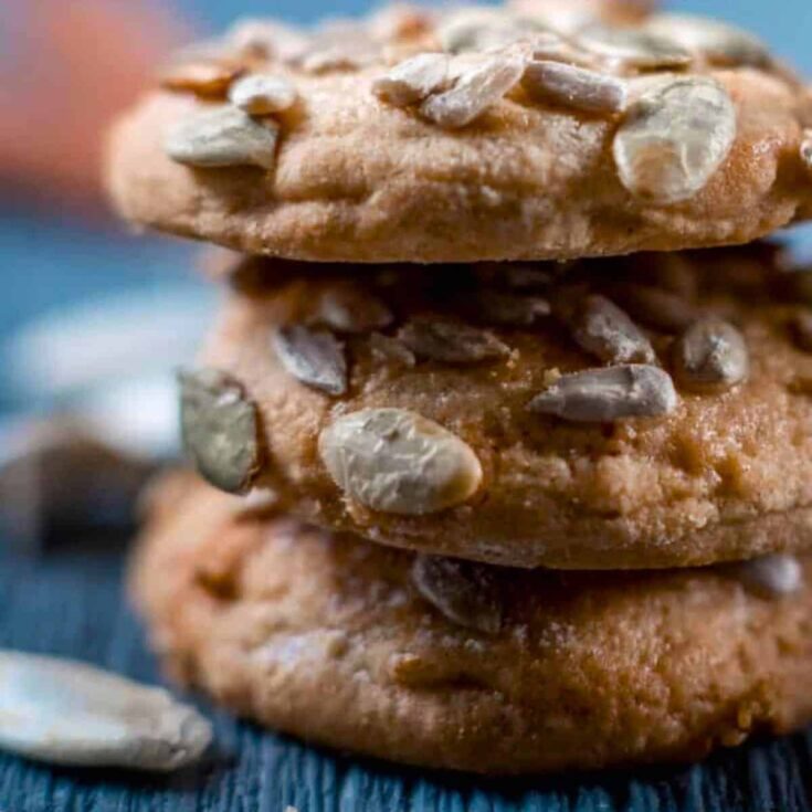 A stack of pumpkin chocolate chip cookies baked after reading these Chocolate Thanksgiving Desserts