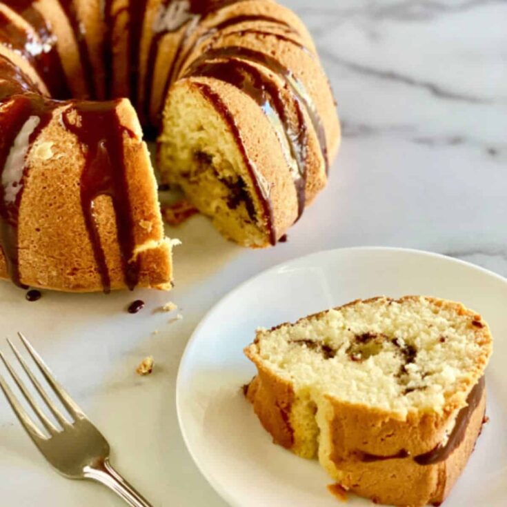 A slice of sour cream cake baked after reading these Christmas Bundt cake recipes