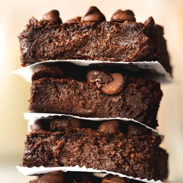 A stack of vegan pumpkin brownies baked after reading these Chocolate Thanksgiving Desserts