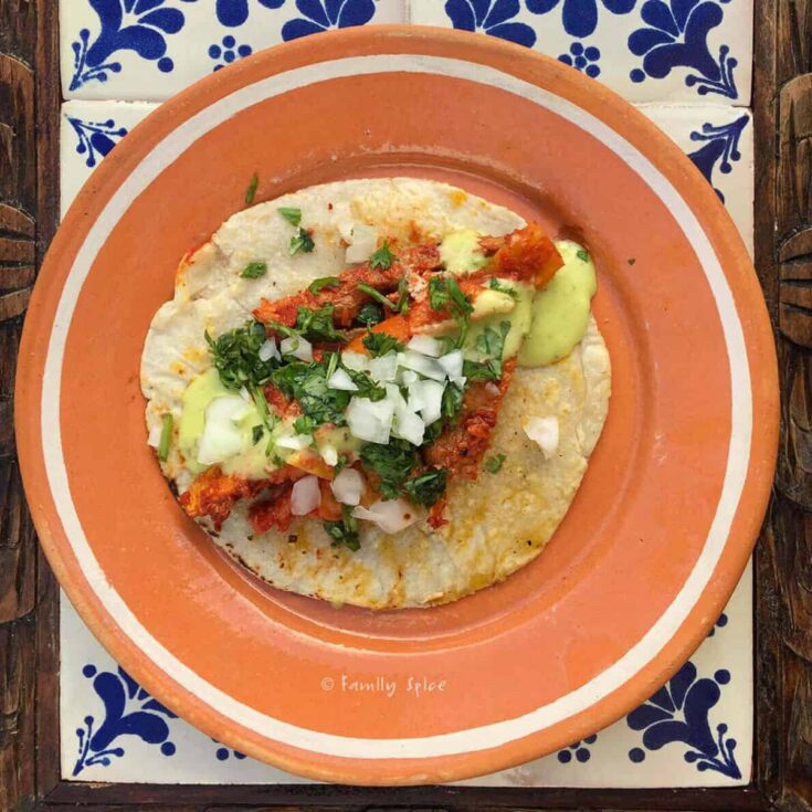 Adobada tacos prepared on a plate after reading these Taco Tuesday recipes