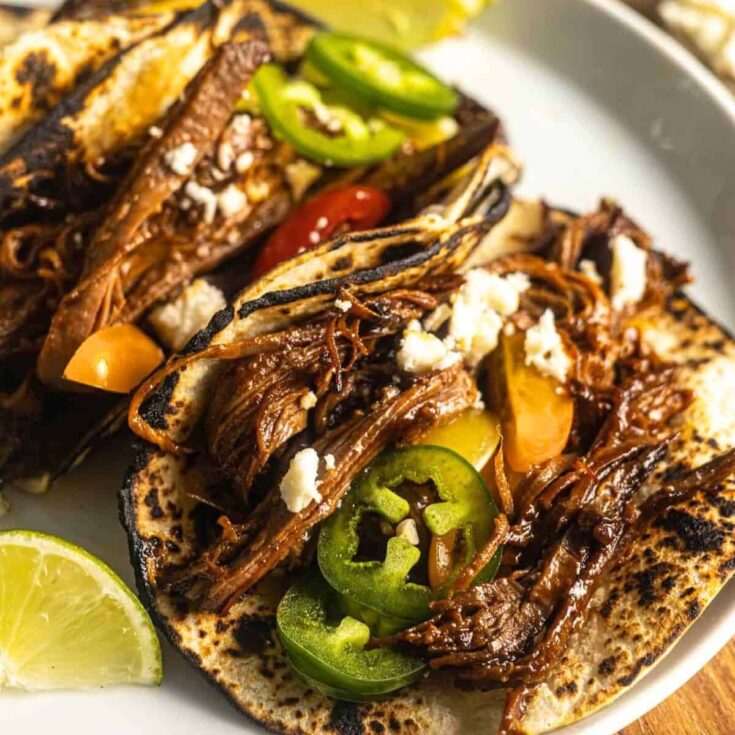 Two sets of Brisket tacos prepared after reading these Taco Tuesday recipes