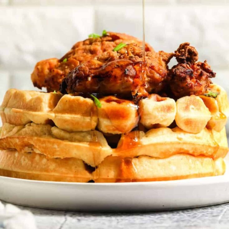 A plate of buttermilk chicken and waffles made after reading these Wonderful waffle recipes