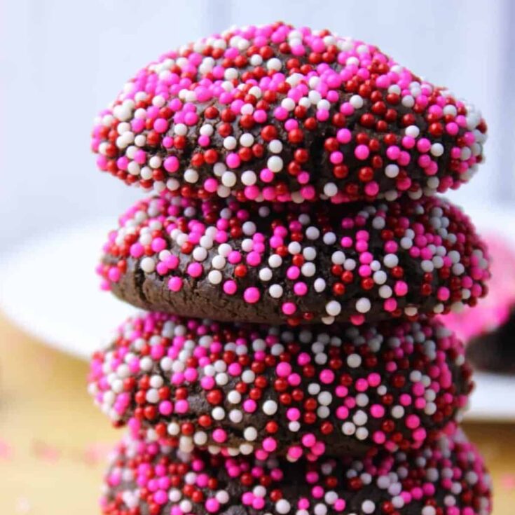 A stack of chocolate cream cheese cookies filled with sprinkles, made after reading these Valentine cookies