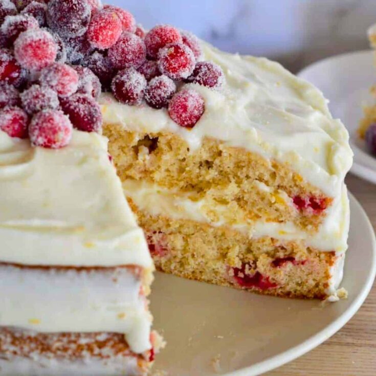 Sliced cranberry orange cake baked after reading these Christmas cake recipes