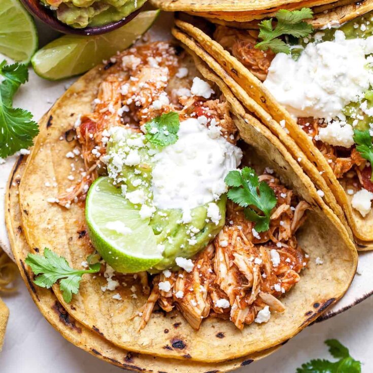 Crockpot chicken tacos prepared after reading these Taco Tuesday recipes