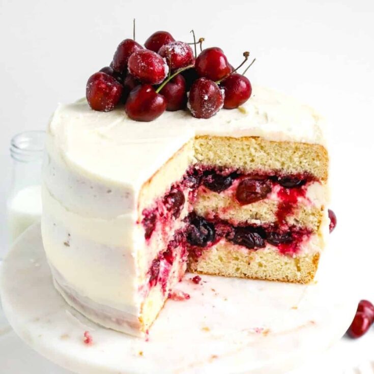 Sliced white forest cake baked after reading these Christmas cake recipes