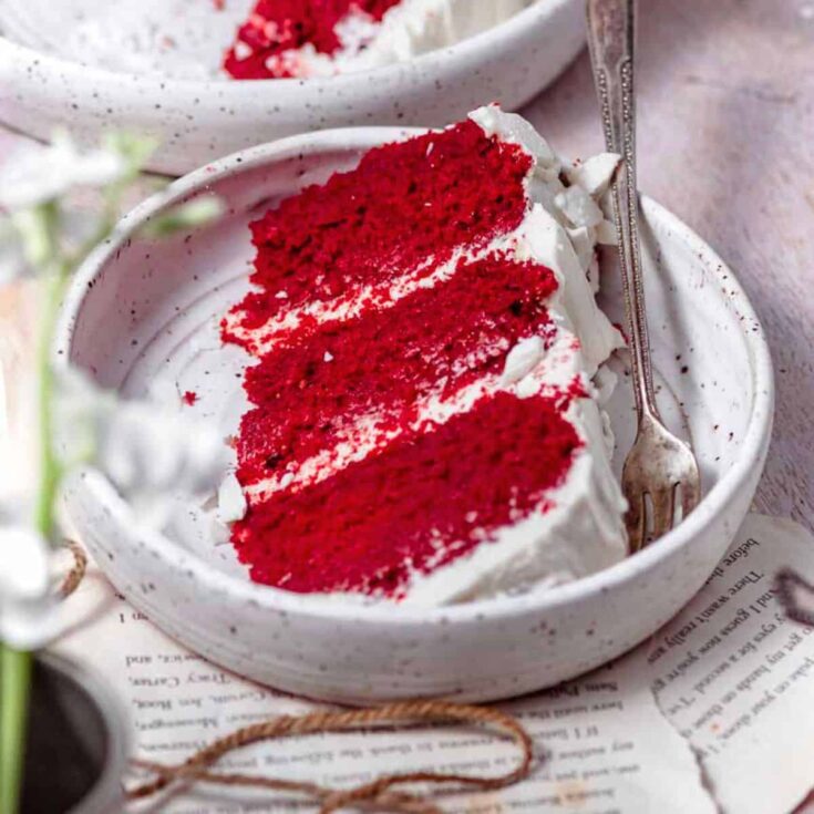 A slice of eggless red velvet cake baked after reading these Christmas cake recipes
