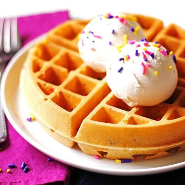 Funfetti waffles topped with sprinkles, made after reading these Wonderful waffle recipes