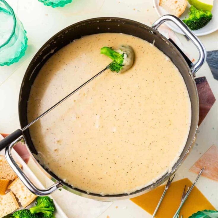 A bowl of gluten-free Swiss cheese fondue prepared after reading these Easy fondue recipes