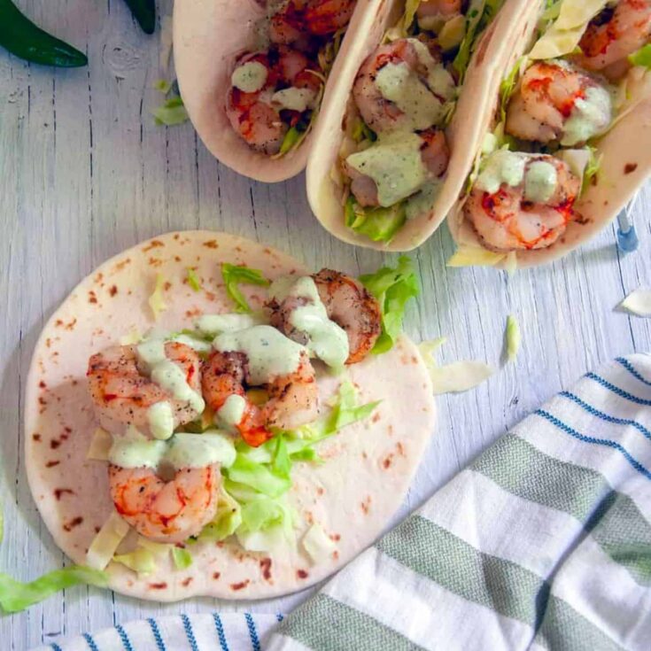A set of grilled shrimp tacos prepared after reading these Taco Tuesday recipes