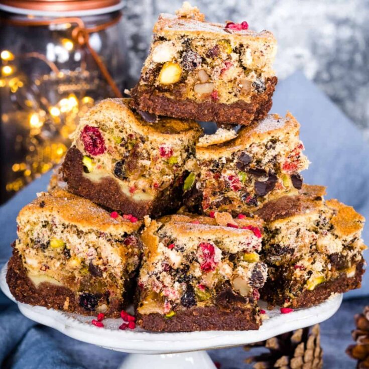 A stack of healthy fruitcake with chocolate and meringue baked after reading these Christmas cake recipes