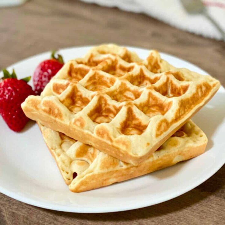 Mochi waffles with strawberries on the side, made after reading these Wonderful waffle recipes