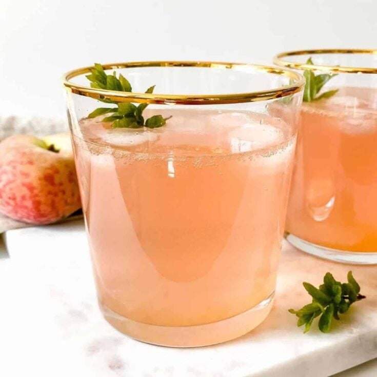 Peach mocktail made after reading these non-alcoholic pink drinks for Valentine's Day