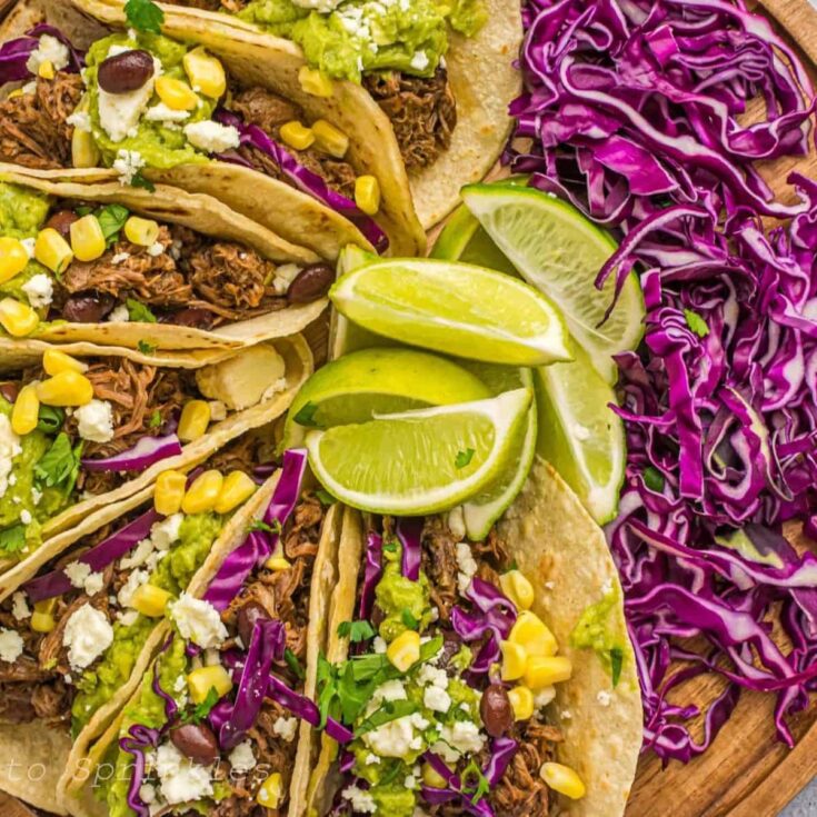 Slow cooker shredded beef tacos prepared after reading these Taco Tuesday recipes