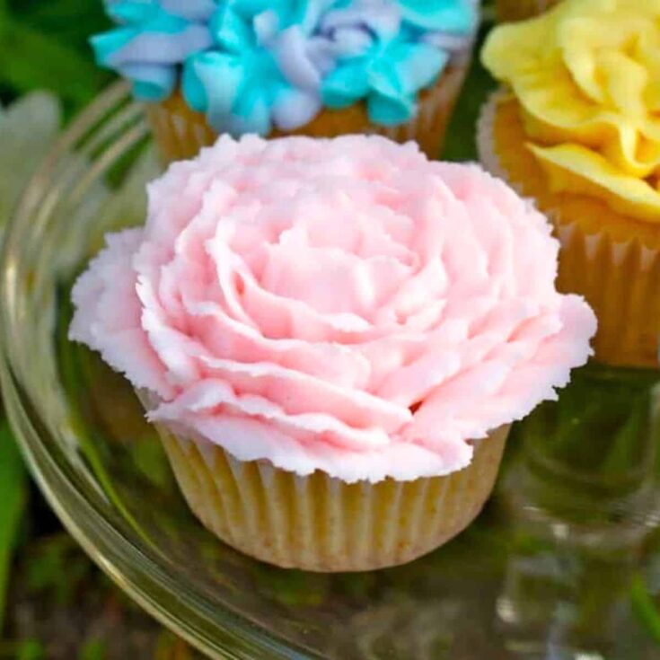 Pink spring flower cupcake baked after reading these Easter cupcake recipes