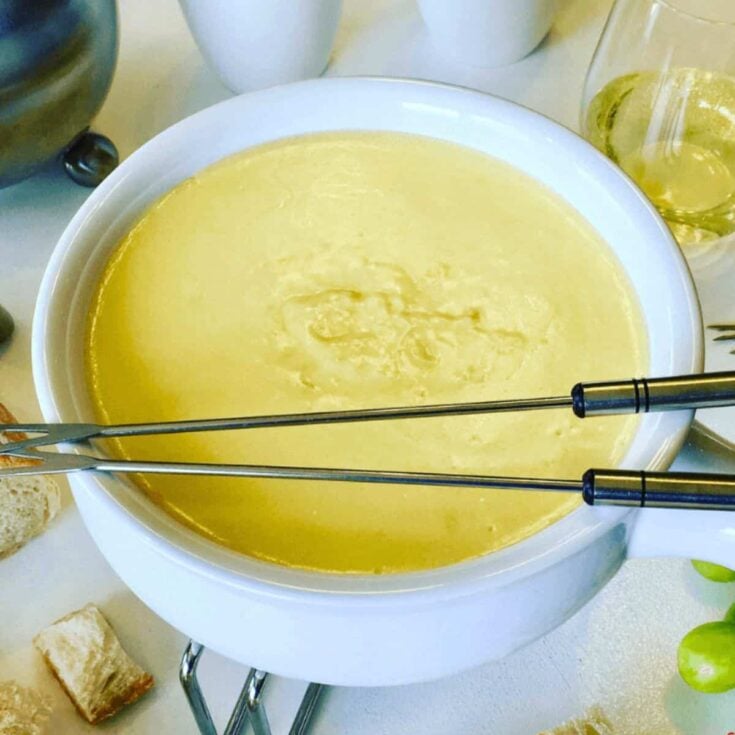 A bowl of Swiss cheese fondue made after reading these Easy fondue recipes