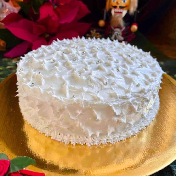 Traditional British fruit cake with royal icing baked after reading these Christmas cake recipes