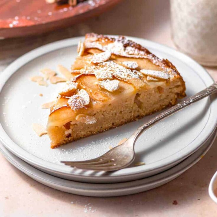 A slice of vegan Italian pear almond baked after reading these Christmas cake recipes