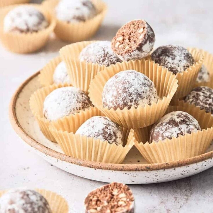 A plate filled with Bourbon balls perfect as Christmas treats