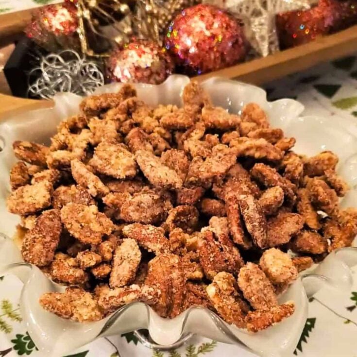 A bowl of Bourbon cinnamon sugar pecans made after reading these Christmas candy recipes