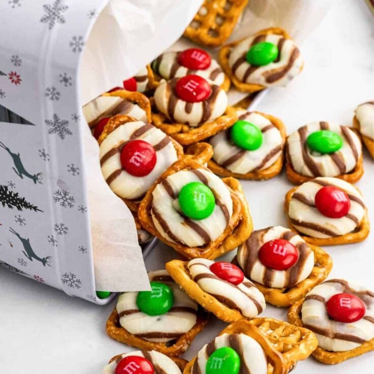 Christmas pretzel hugs with m and m toppings perfect as Christmas treats