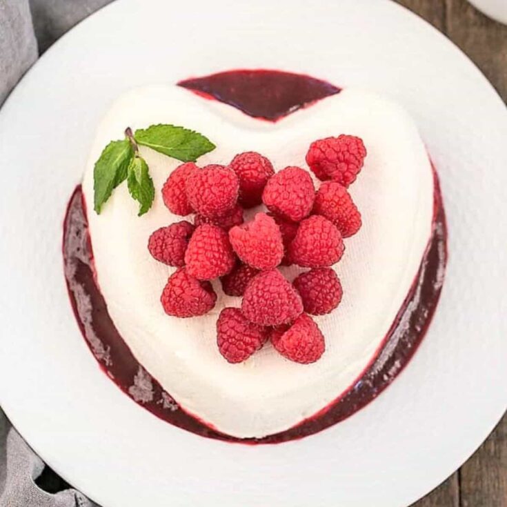 A plate of Coeur a la creme heart shaped dessert made after reading these Valentines Day Desserts