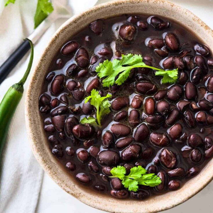 A bowl of Frijoles de la olla made after reading these Cinco de Mayo dinner recipes