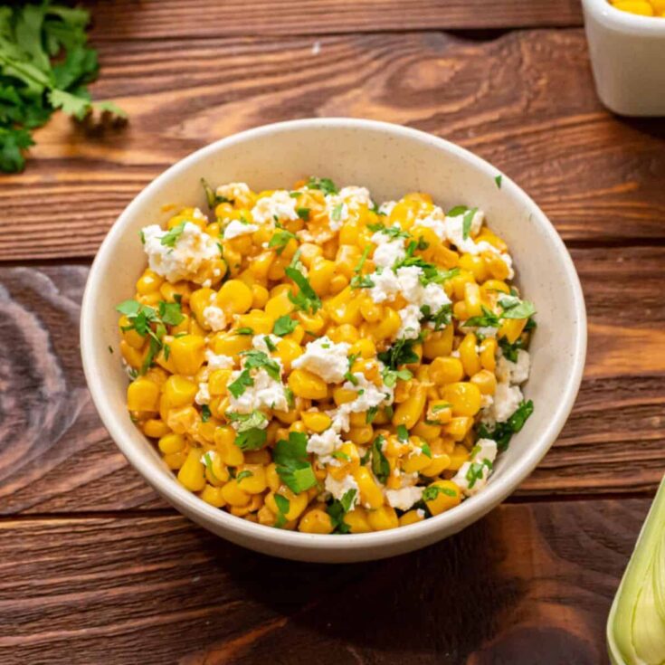 A bowl of Mexican street corn casserole perfect for Cinco de Mayo dinner