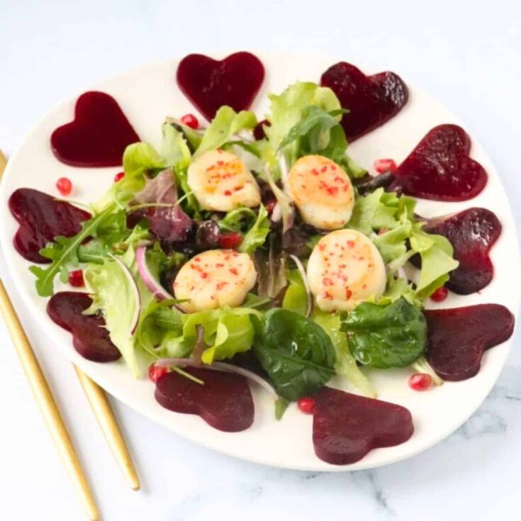 A plate of pan seared scallops made after reading these Valentines appetizers