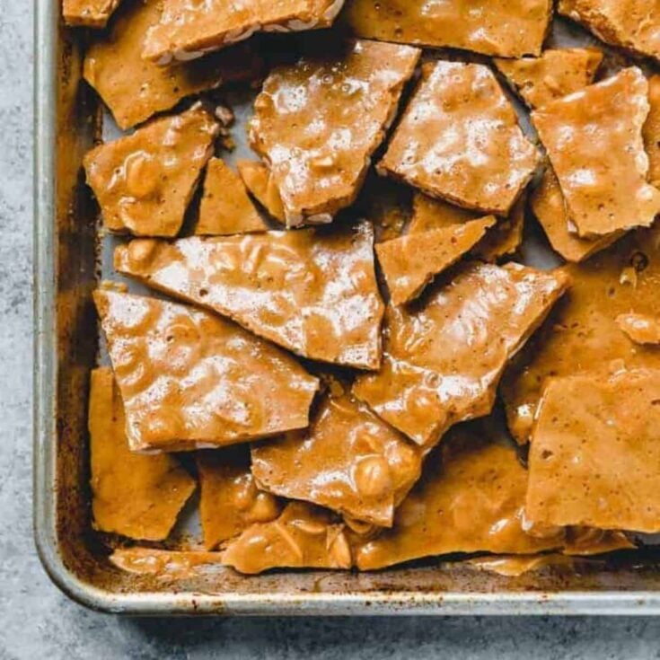 A tray filled with peanut brittle made after reading these Christmas treats