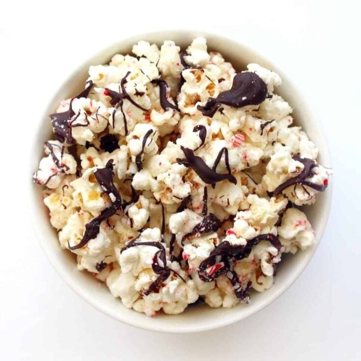 A bowl of peppermint bark popcorn perfect as Christmas treats