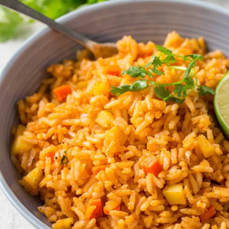A bowl of restaurant style Mexican rice made after reading these Cinco de Mayo dinner recipes