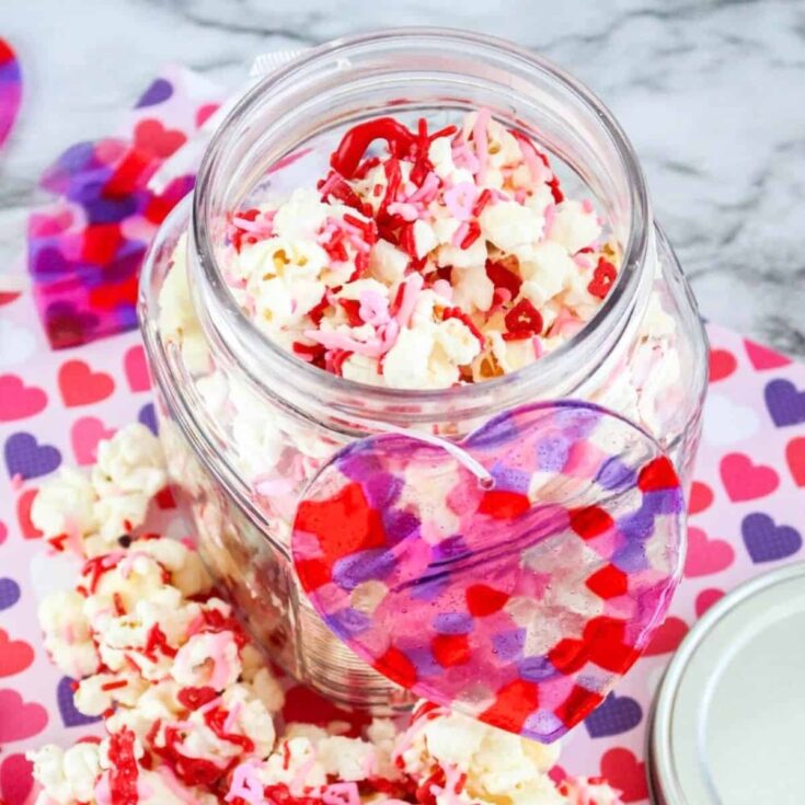 A glass of sweetheart popcorn made after reading these Valentines Day Desserts